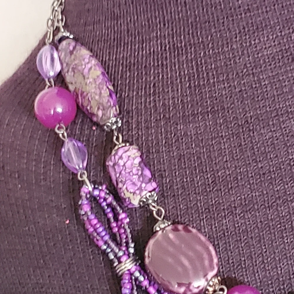 Gunmetal double strand necklace with purple seed bead bows and marble look beads